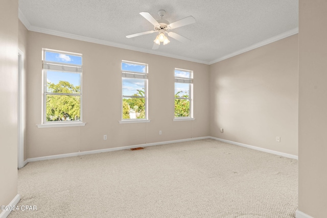 unfurnished room featuring a textured ceiling, crown molding, light carpet, and ceiling fan