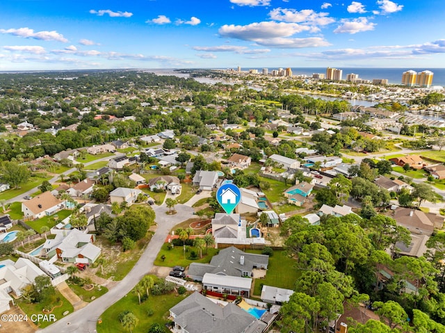 drone / aerial view with a water view