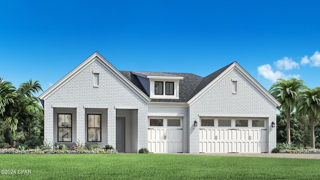 view of front of property with a front yard and a garage