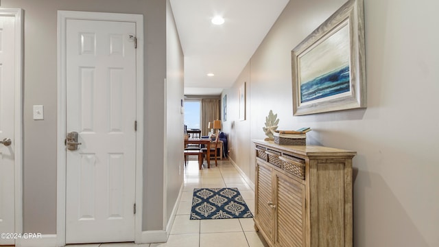 hallway with light tile patterned floors