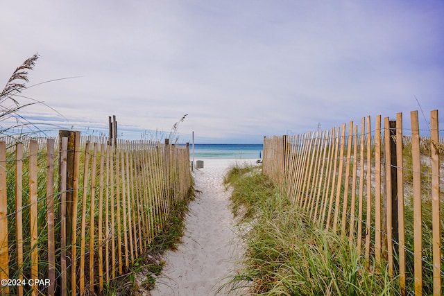 property view of water with a beach view