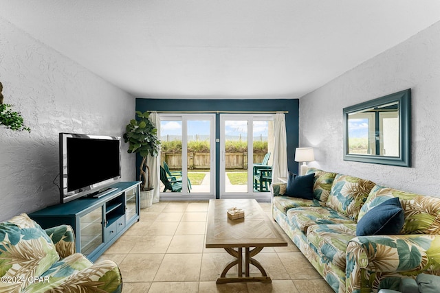 living room with light tile patterned floors