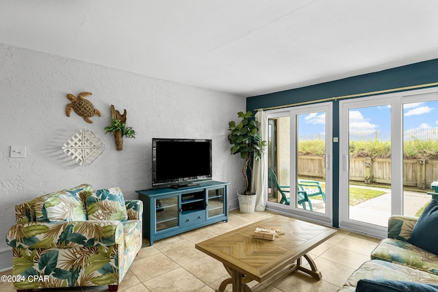 living room featuring light tile patterned flooring