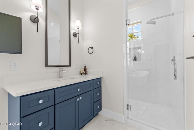 bathroom with vanity and walk in shower