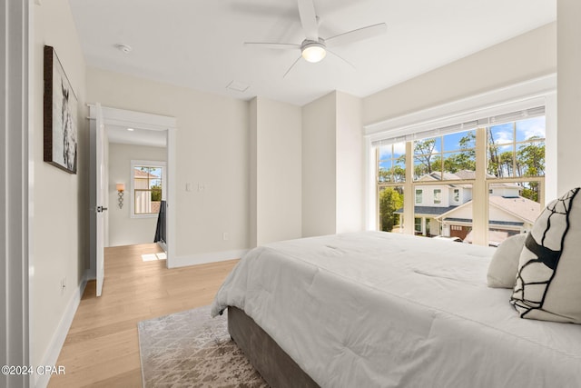 bedroom featuring ceiling fan and light wood-type flooring