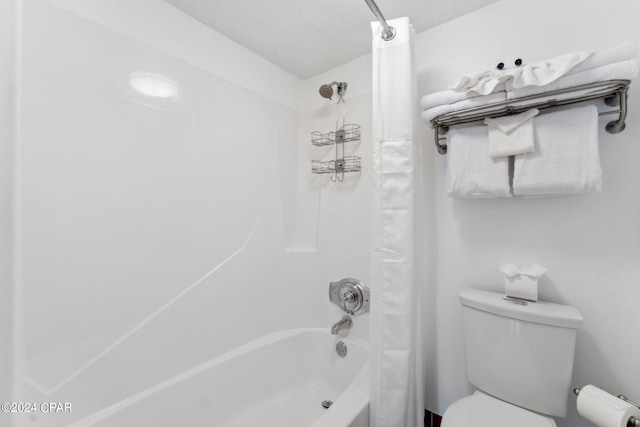 bathroom with shower / bathtub combination with curtain and toilet