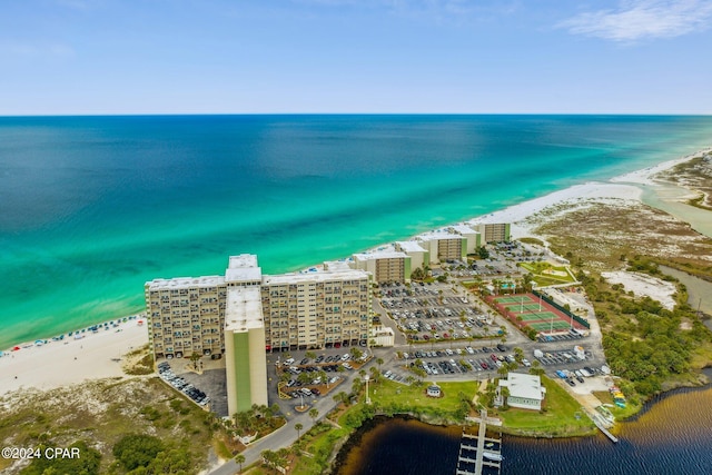 drone / aerial view with a water view and a view of the beach