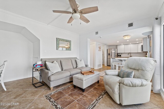 23223 Front Beach Rd Ph 4, Panama City Beach, FL 32413 - living room with ceiling fan, light tile patterned floors, and ornamental molding