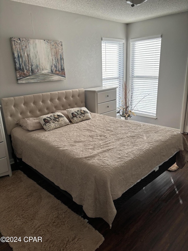 bedroom with a textured ceiling