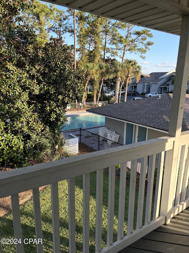 exterior space featuring a fenced in pool