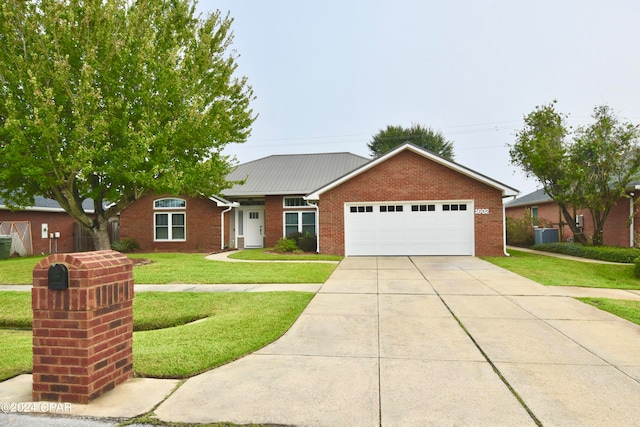 ranch-style home featuring a front yard and a garage