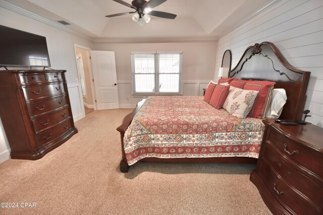 bedroom featuring ceiling fan, light colored carpet, and crown molding