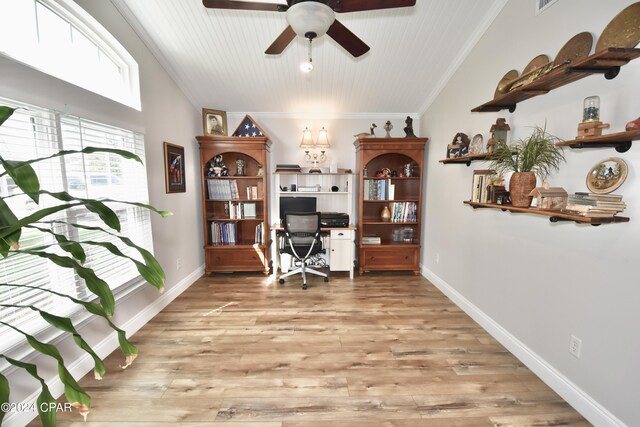 home office featuring ceiling fan, light wood-type flooring, and ornamental molding