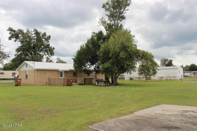 view of yard featuring a deck