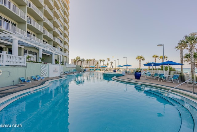 9450 S Thomas Dr Unit 402, Panama City, FL 32408 - community pool featuring a patio area
