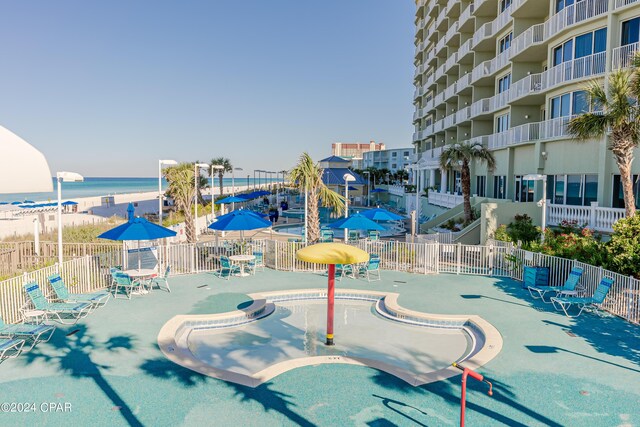 view of pool featuring pool water feature