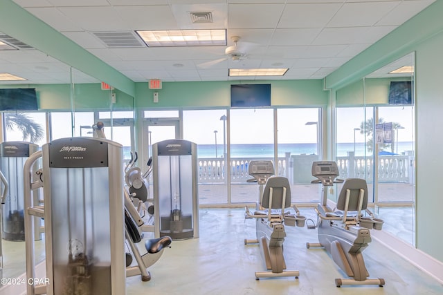 workout area with visible vents and a drop ceiling