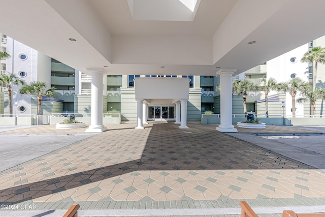 property entrance featuring stucco siding