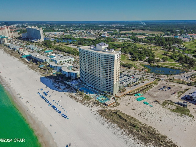 bird's eye view featuring a view of city, a water view, and a view of the beach