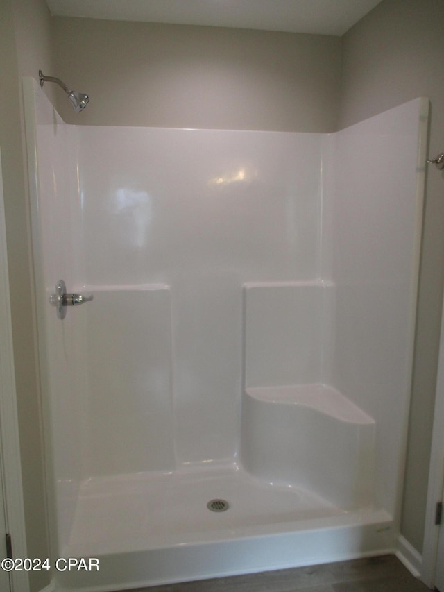 bathroom featuring walk in shower