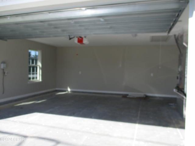 garage with a garage door opener