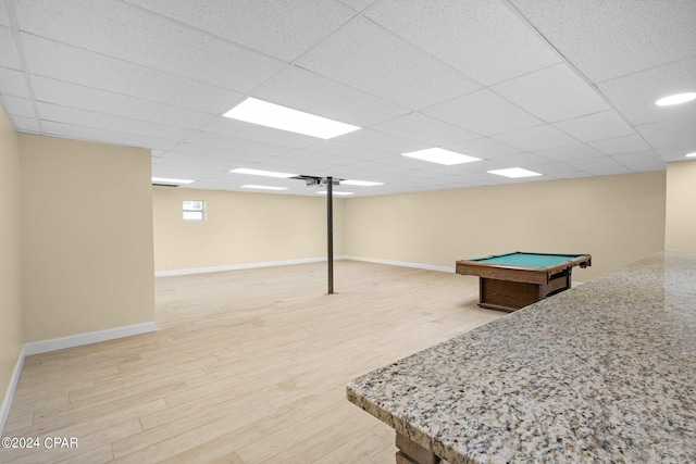 recreation room featuring pool table, a paneled ceiling, and hardwood / wood-style floors