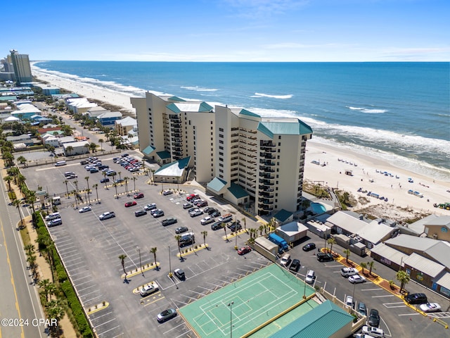 aerial view featuring a water view and a beach view