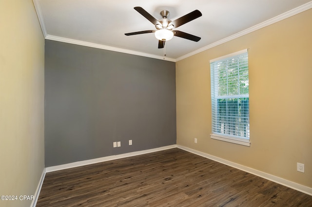 empty room featuring ceiling fan, ornamental molding, and dark hardwood / wood-style flooring