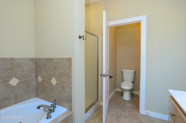 bathroom featuring separate shower and tub, tile patterned floors, and vanity