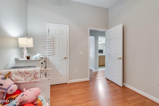 bedroom with light wood-type flooring