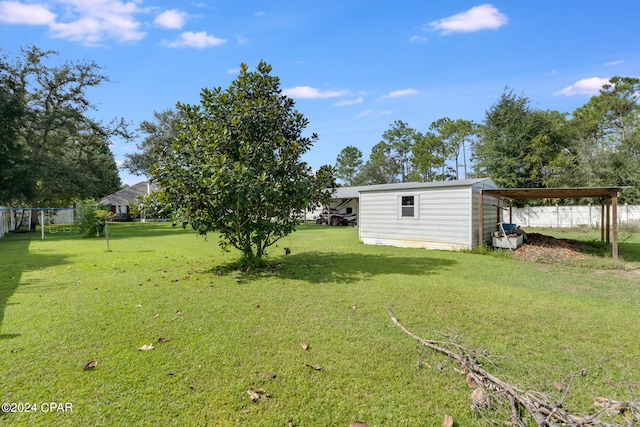 view of yard with a carport