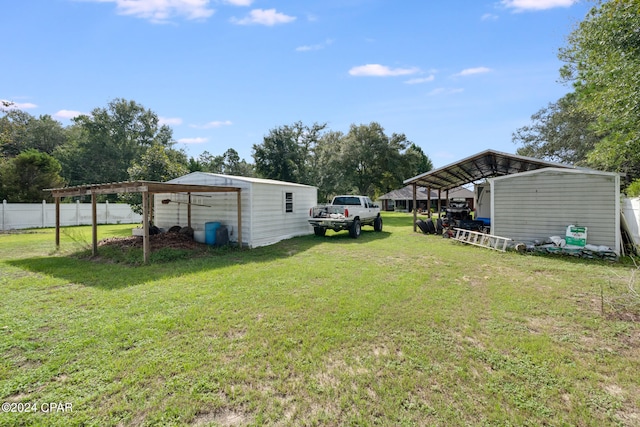 view of yard featuring a carport