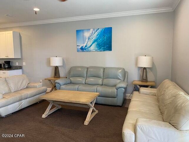 carpeted living room featuring crown molding