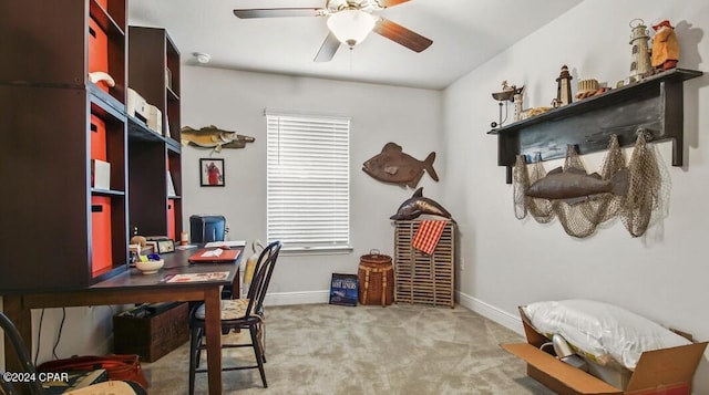 office area featuring ceiling fan and light colored carpet