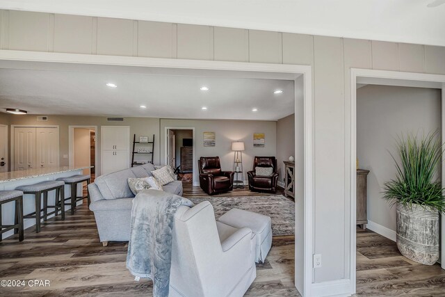 living room featuring dark hardwood / wood-style floors