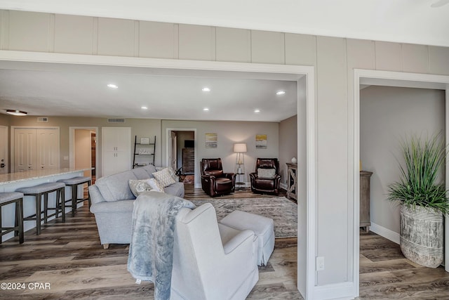 living room with dark wood-type flooring