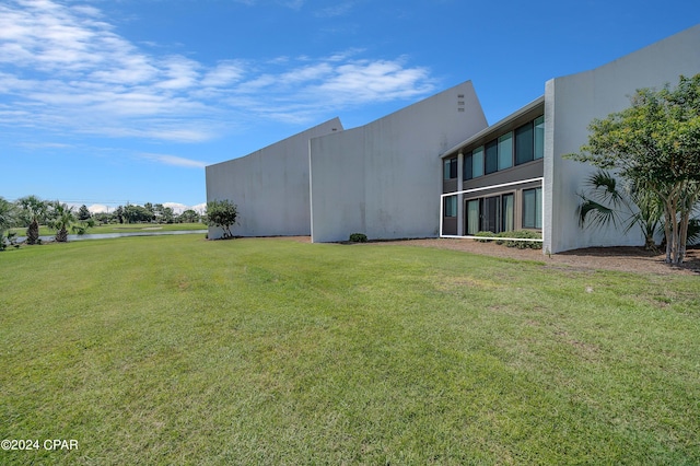 view of property with a yard