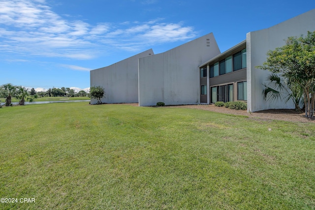 view of property with a lawn