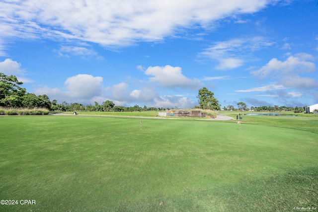 view of home's community with a lawn