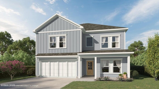 view of front of home featuring a garage and a front lawn