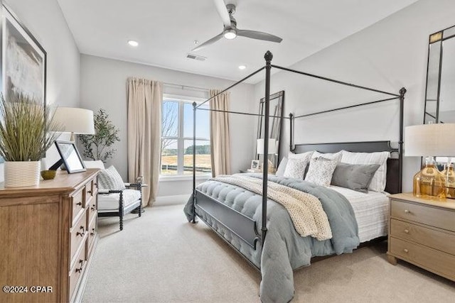 carpeted bedroom with ceiling fan