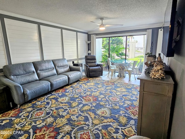 living room with ornamental molding, ceiling fan, hardwood / wood-style floors, and a textured ceiling