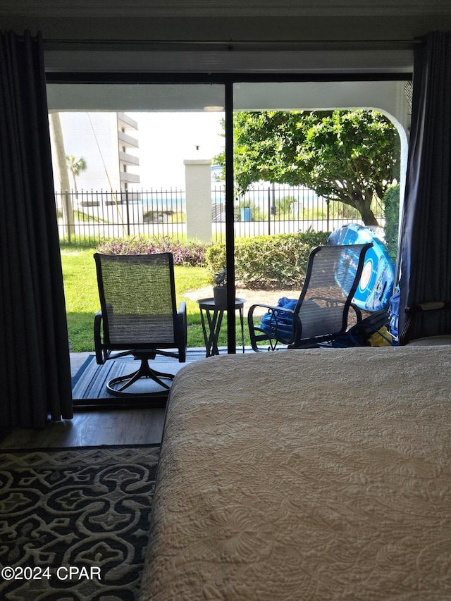 bedroom with hardwood / wood-style flooring