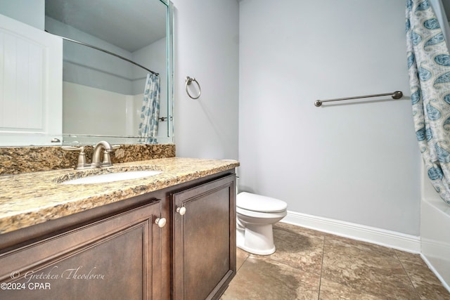 full bathroom with shower / tub combo, vanity, and toilet