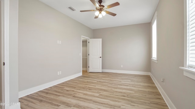 unfurnished bedroom featuring ceiling fan and light wood-type flooring