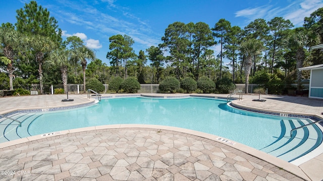 view of pool with a patio