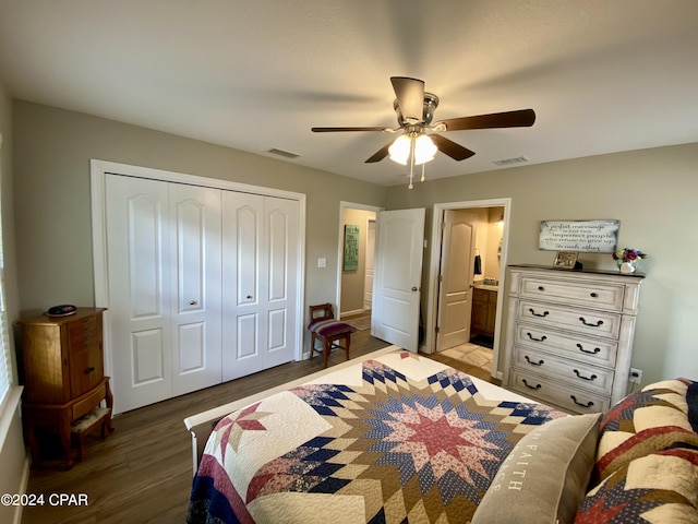 bedroom featuring ensuite bath, ceiling fan, a closet, and hardwood / wood-style flooring