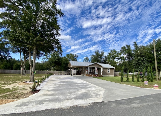 view of front of house featuring a front lawn and a porch