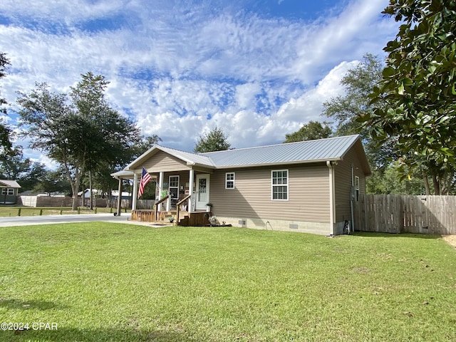 view of front of house with a front lawn and a porch