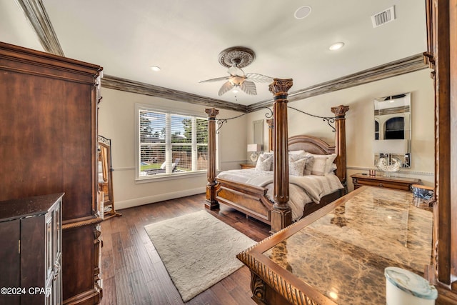 bedroom with crown molding, dark wood-type flooring, and ceiling fan